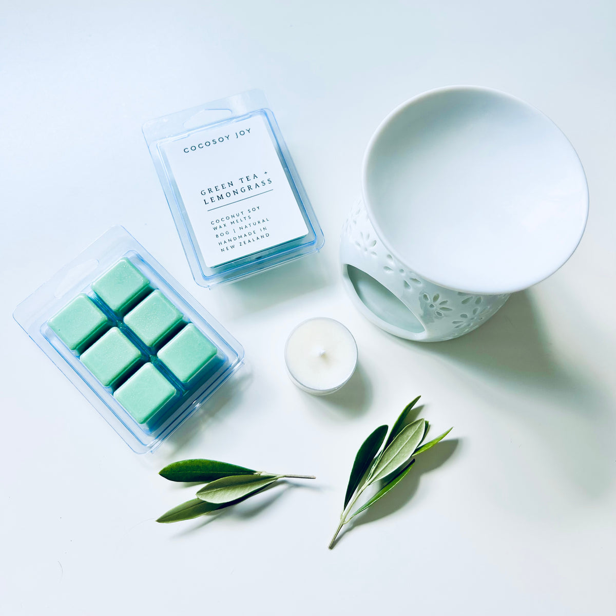 Green Tea and Lemongrass Coconut Soy wax melts. Made from natural coconut and soy waxes and high-quality fragrance oils. Vegan, paraffin-free, and phthalate-free. A safer and cleaner way to make your home beautifully fragrant. Handmade in New Zealand. Available at Cocosoy Joy NZ.