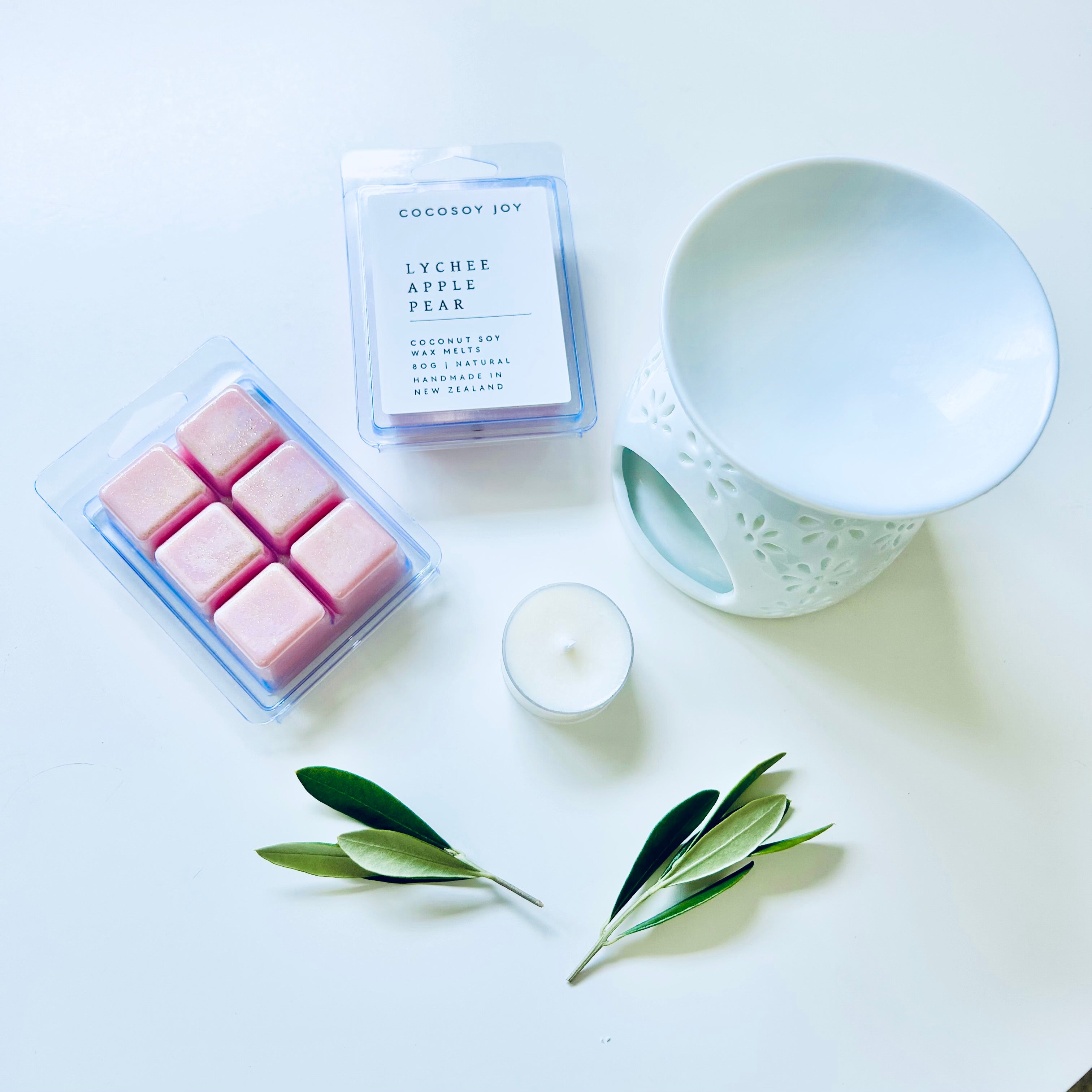 Lychee apple pear coconut soy wax melts. Made from natural, plant-based, and paraffin-free coconut and soy waxes. Safer and cleaner home fragrance. Handmade in New Zealand. Available at Cocosoy Joy NZ. Perfect for gifts or everyday home fragrance. 
